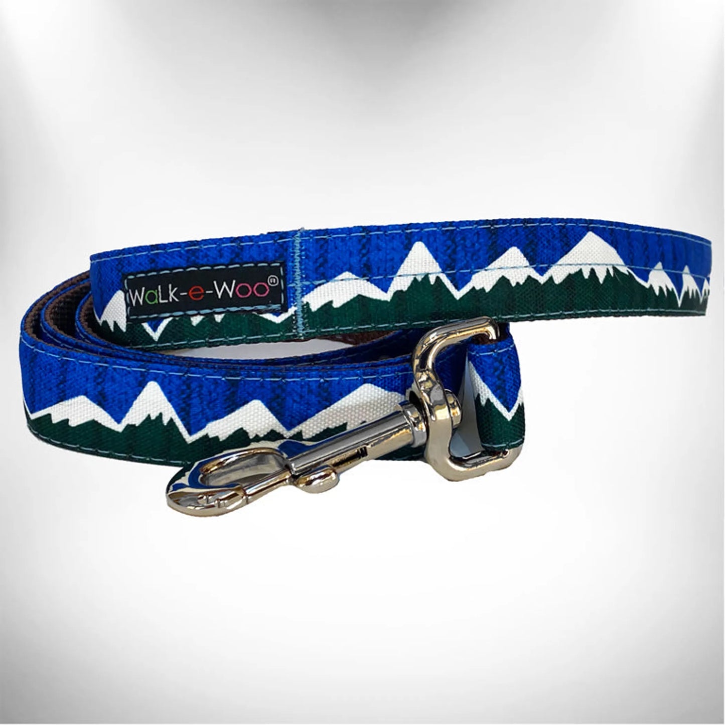 Dog leash with mountain design and 'Walk-e-Woo' branding on a white background