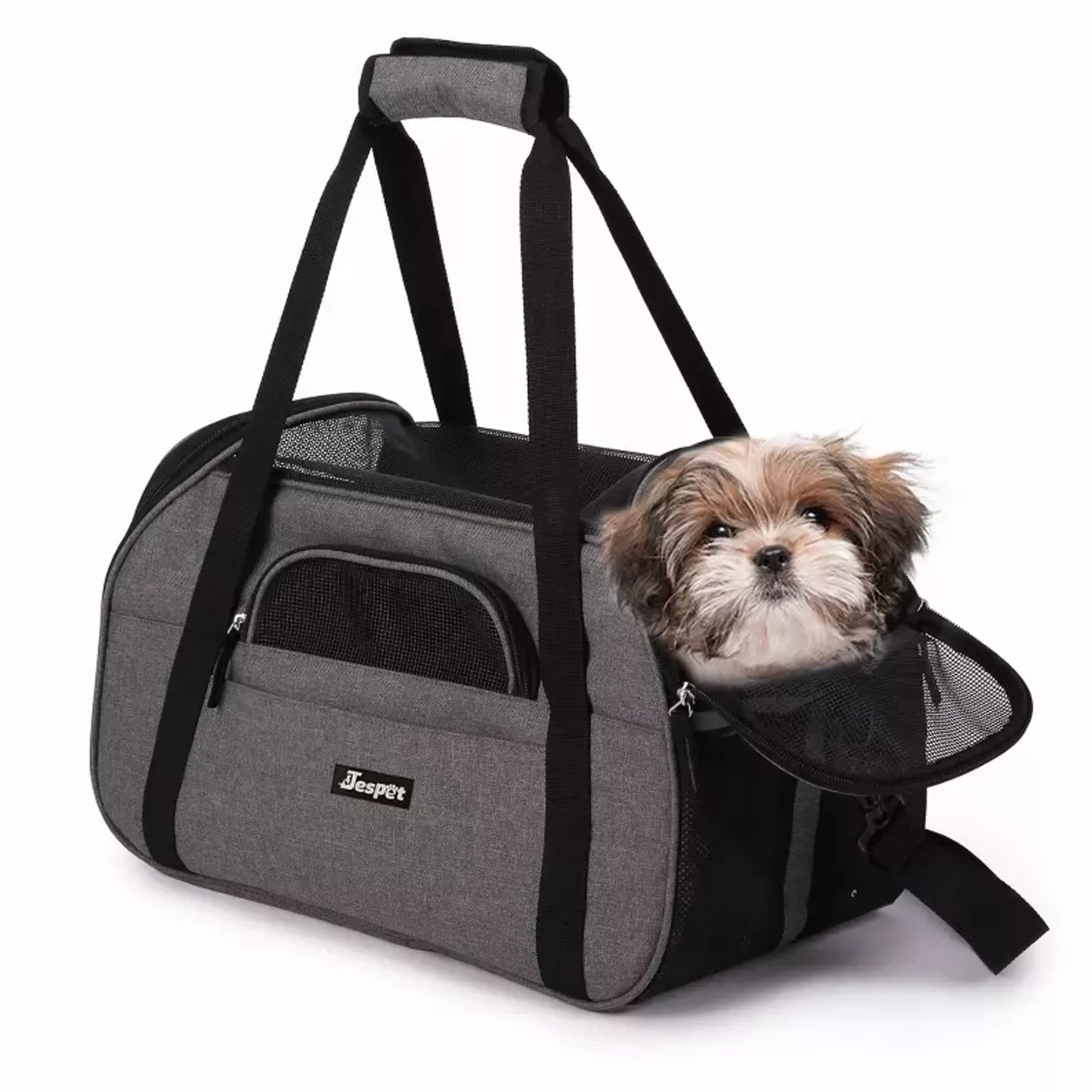 Gray pet carrier with a small dog peeking out on a white background