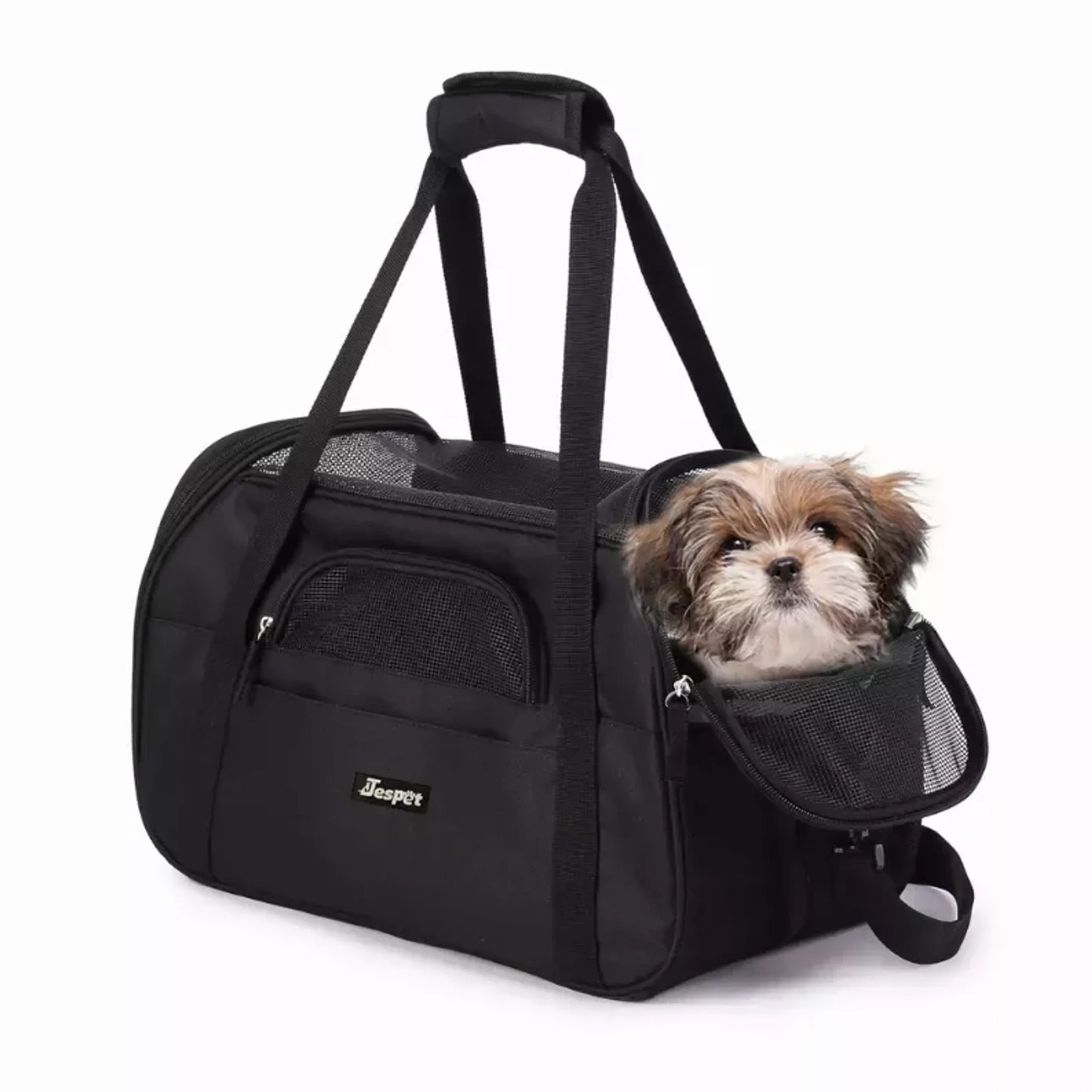 Black pet carrier with a small dog inside on a white background
