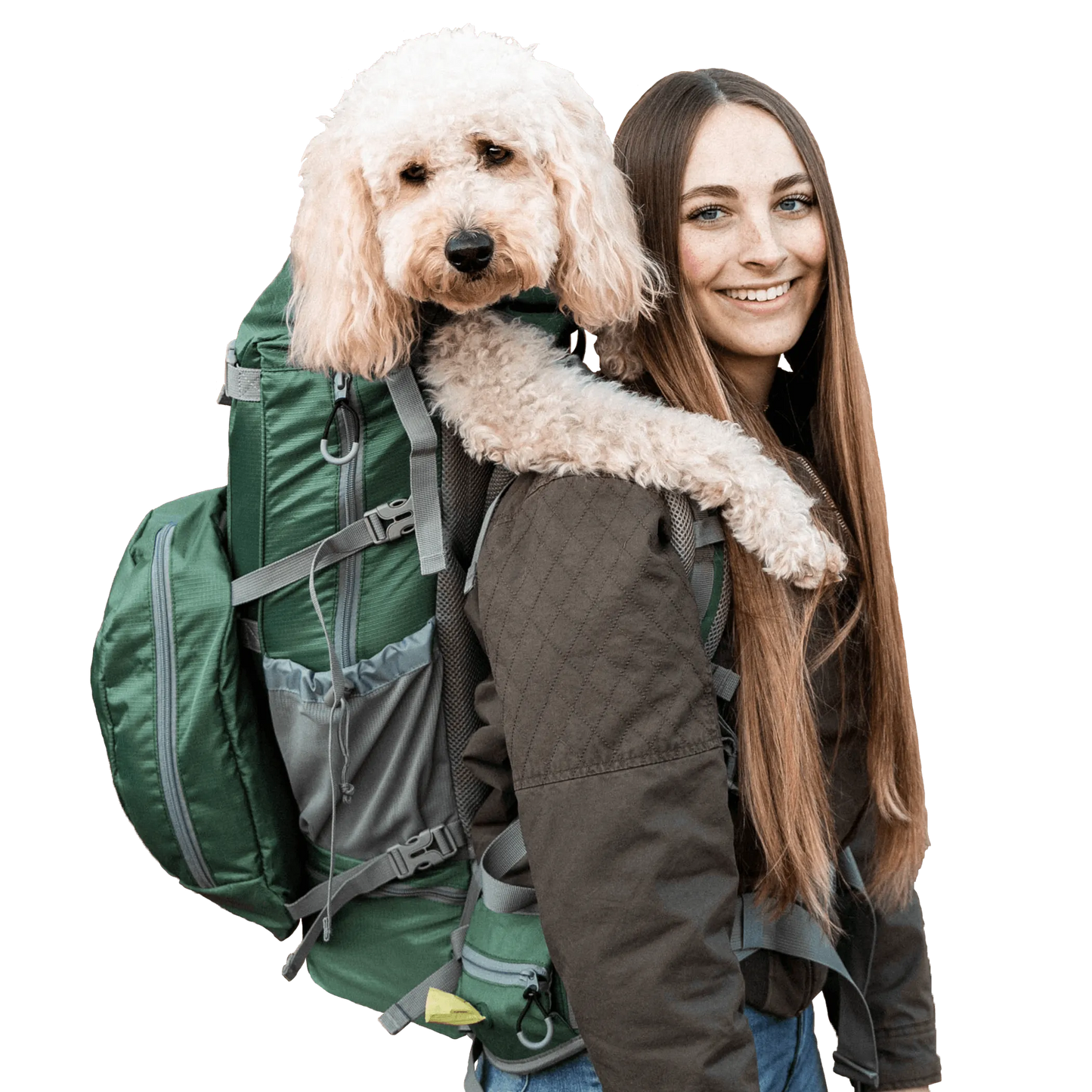 Woman holding a fluffy dog over her shoulder with a green backpack on a white background