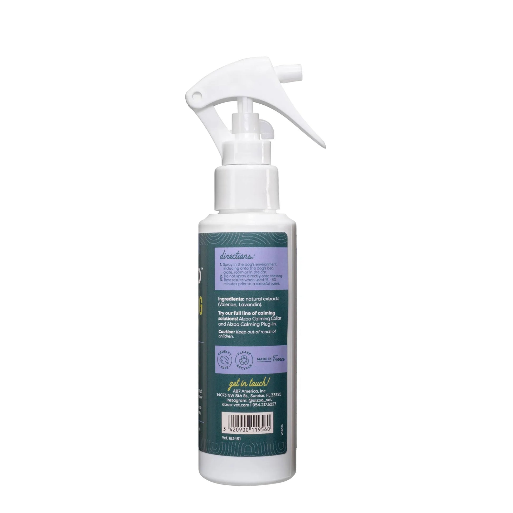 White spray bottle with a label on a white background