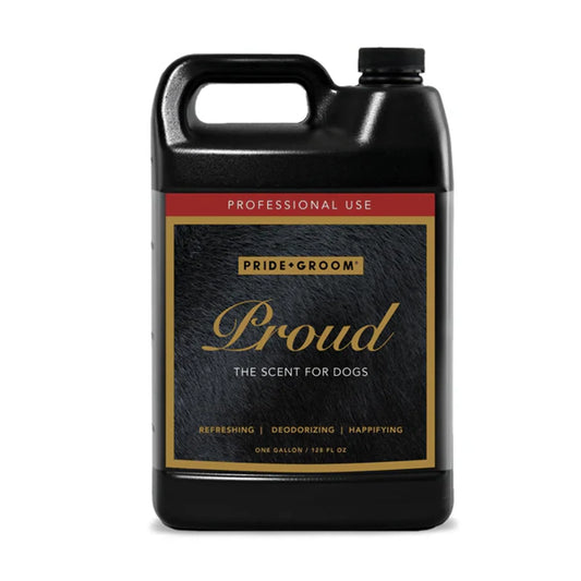 Black bottle of 'Proud' dog grooming product with gold and red text on a white background
