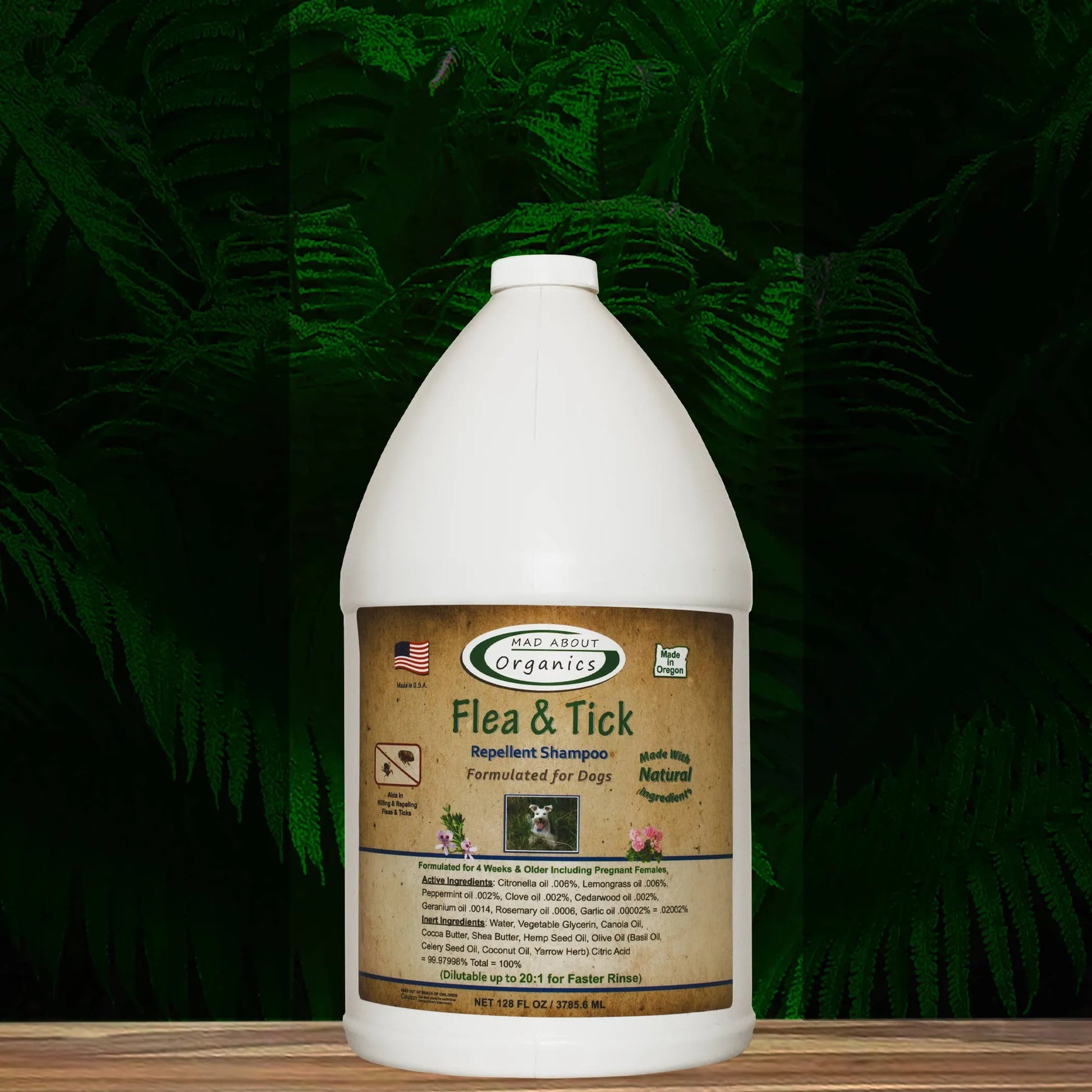 Flea and tick repellent shampoo bottle with a green leafy background