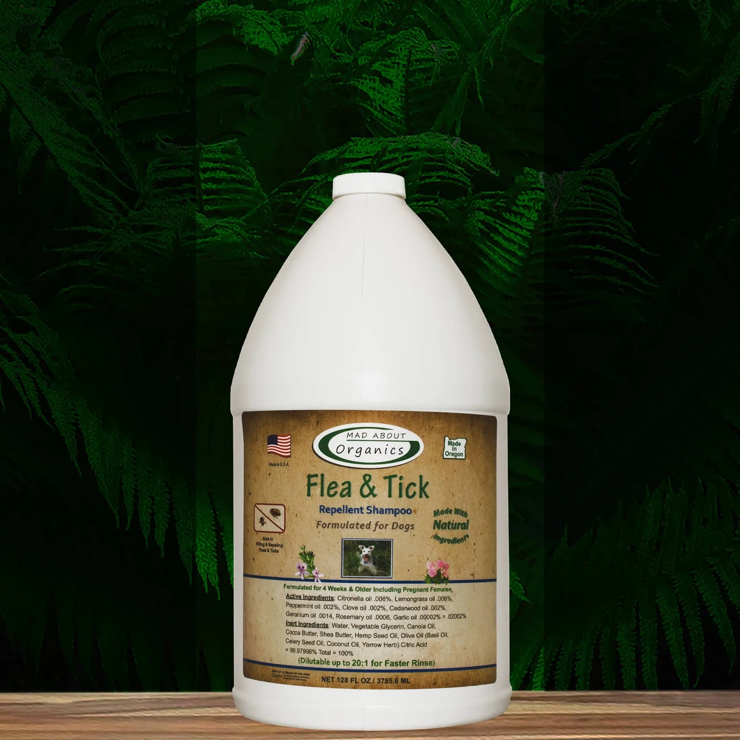 Flea and tick repellent shampoo bottle with a green leafy background