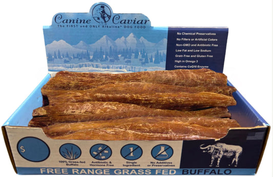 Box of Canine Caviar free range grass fed buffalo dog treats with branding and product details.