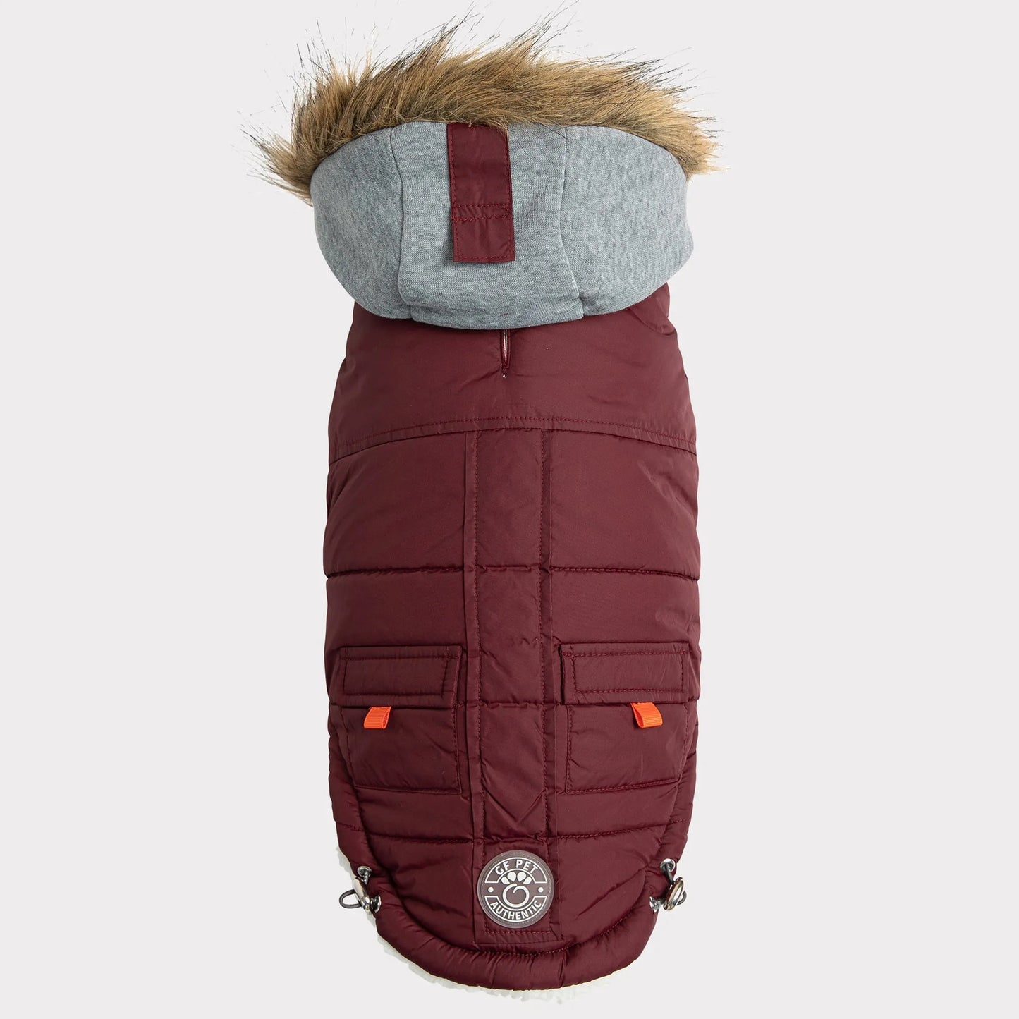 Maroon dog coat with gray hood and fur trim on a white background