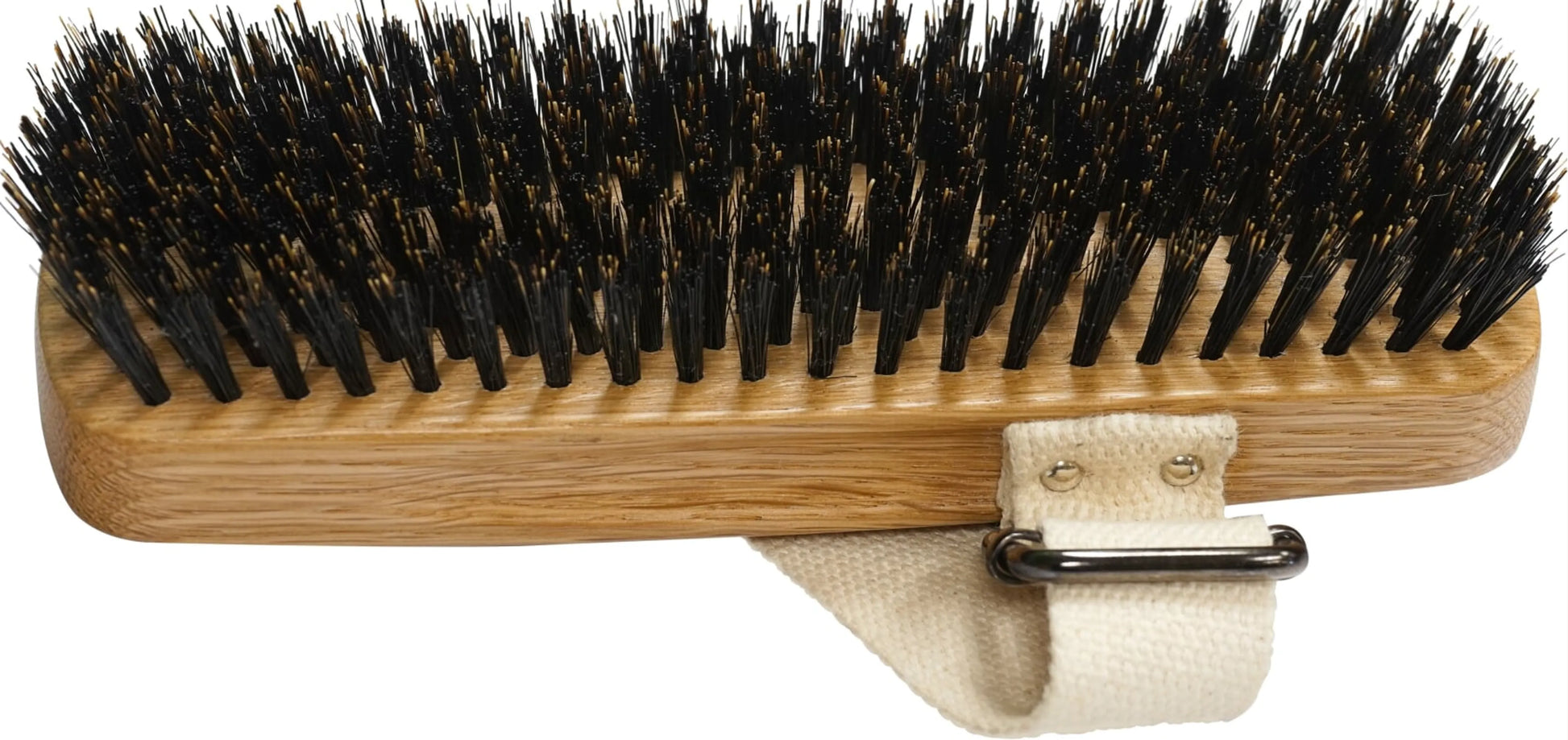 Bristle brush with wooden handle and strap on a white background